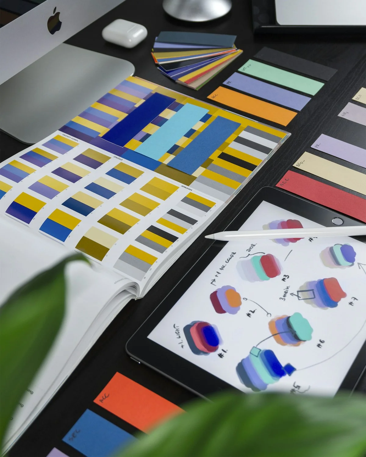 Freelance designer working with AI design tools on dual monitor setup — Midjourney Canva AI and Adobe Firefly for creative p