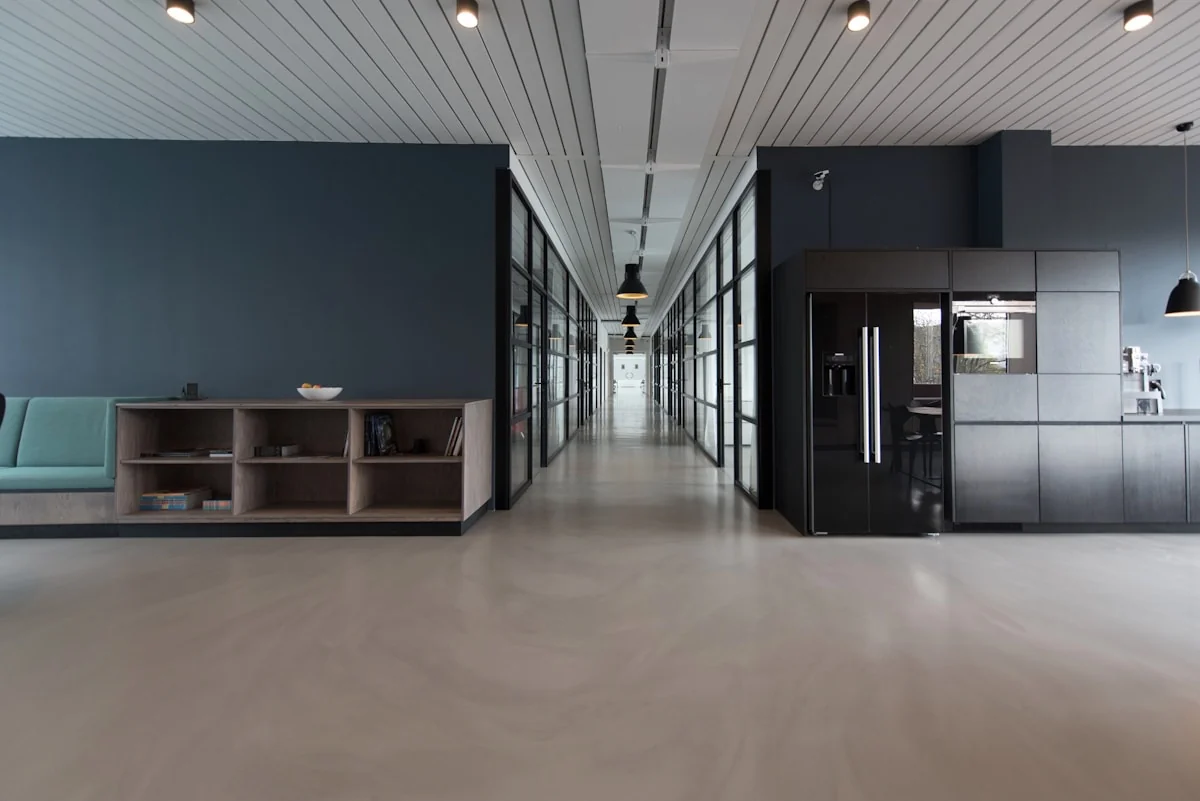 Modern office building with smart energy management system — AI reduces building energy consumption by 40% through intellige