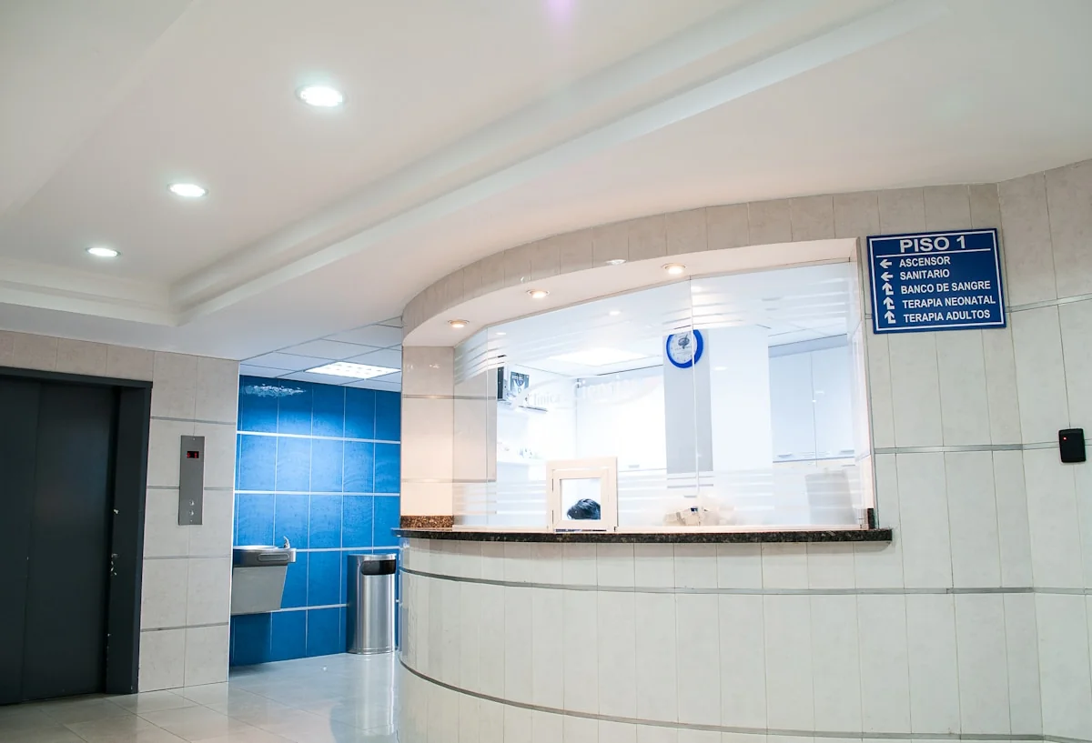Modern hospital ward with nursing staff — best AI tools for hospital operations optimize patient flow scheduling staffing an