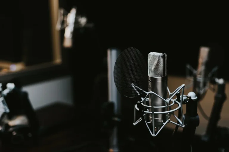Podcaster using Descript AI and Castmagic for transcript editing show notes generation and social media repurposing — best A