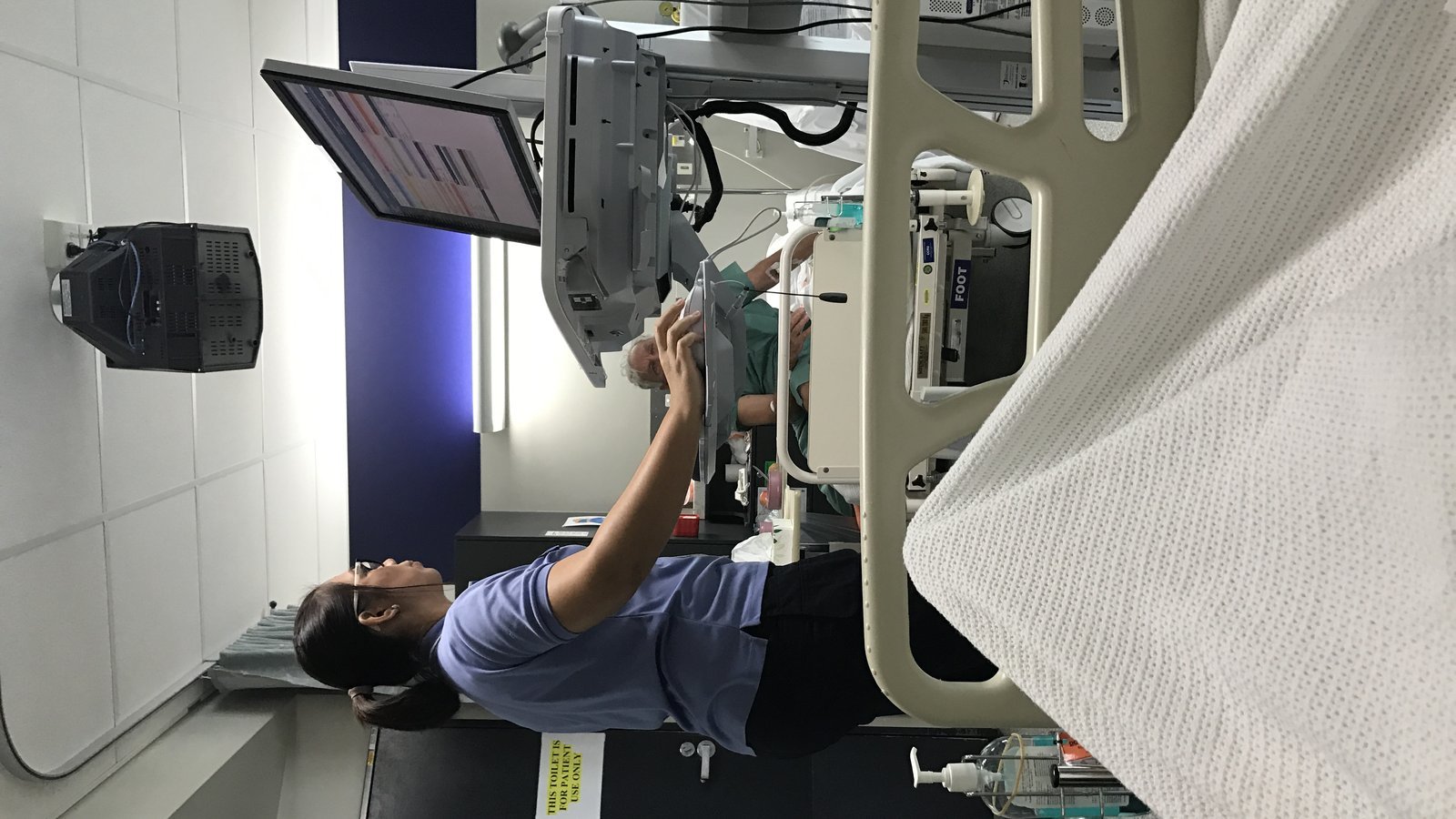 Hospital nurse using a mobile computer work station