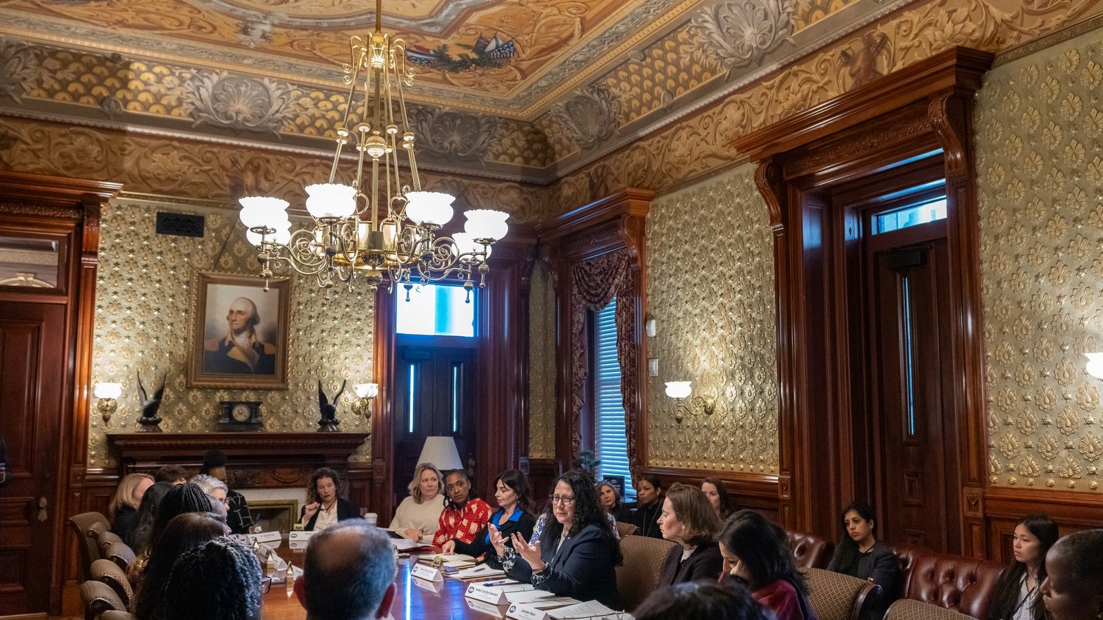 Business professionals meeting around a table in a formal setting