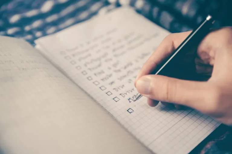 Content strategist planning monthly social media calendar with AI scheduling assistant 2026
