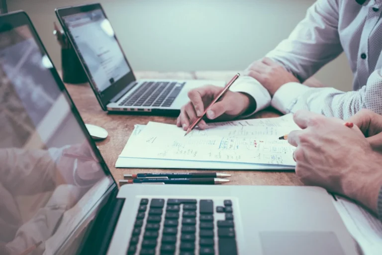 Prompt engineer reviewing compensation data and career benchmarks on analytics dashboard 2026