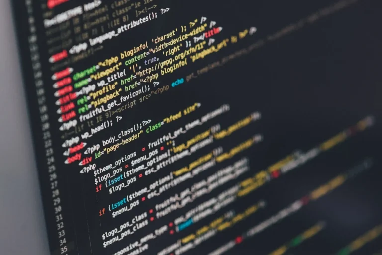 Developer using AI coding tools for autonomous implementation code review and debugging 2026