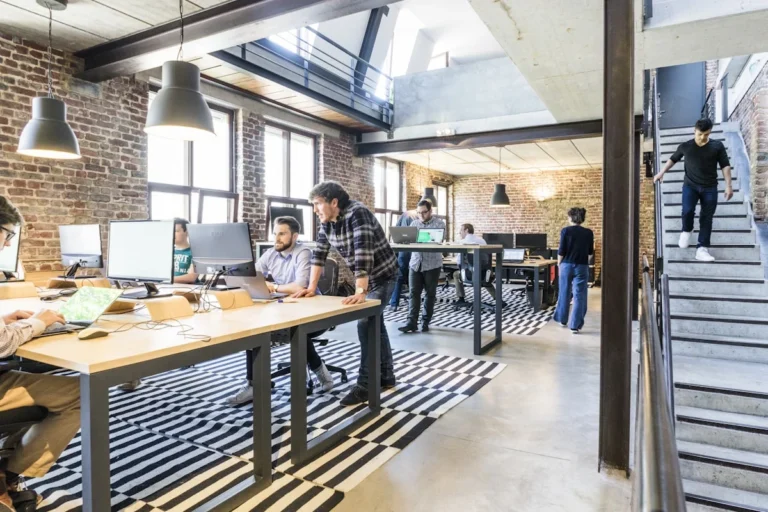 Small business owner using generative AI for content marketing operations and customer communications 2026